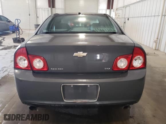 ✅ 2009 Chevrolet Malibu LTZ • VIN: 1G1ZK577994215182 • Lot: 75599644. Listed on Copart with 124,154 mi. Free auction sales archive from the USA and detailed vehicle history report at DreamBid. Image 6.