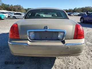 ✅ 2004 Lincoln Town Car Signature • VIN: 1LNHM81W34Y662151 • Lot: 82414495. Listed on Copart with 134,605 mi. Free auction sales archive from the USA and detailed vehicle history report at DreamBid. Image 6.