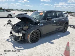 ✅ 2021 MINI Hardtop 4 Door Cooper S • VIN: WMWXU9C07M2P36203 • Lot: 50812605. Wystawiony na Copart z przebiegiem 87 852 mil. Bezpłatny archiwum sprzedaży aukcyjnych z USA i szczegółowy raport historii pojazdu na DreamBid. Zdjęcie 1.