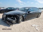 ✅ 2016 BMW 7 Series 750i • VIN: WBA7F0C53GGL99358 • Lot: 80313835. Listed on Copart with 87,729 mi. Free auction sales archive from the USA and detailed vehicle history report at DreamBid. Image 1.