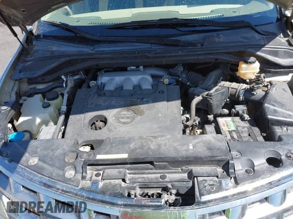 ✅ 2005 Nissan Murano SL • VIN: JN8AZ08T05W310800 • Lot: 42102486. Listed on IAAI with 144,087 mi. Free auction sales archive from the USA and detailed vehicle history report at DreamBid. Image 10.