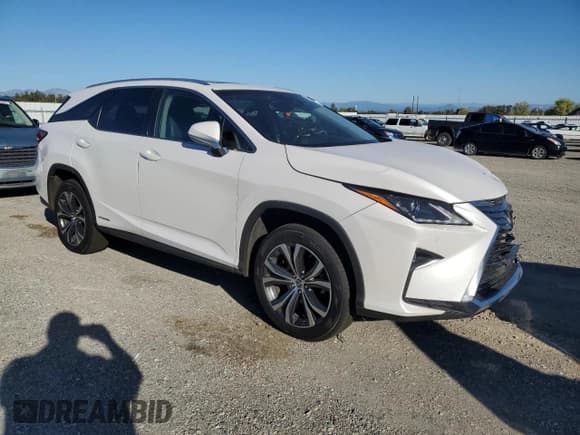 ✅ 2018 Lexus RX 450hL Premium • VIN: JTJDGKCA4J2000549 • Lot: 85295415. Listed on Copart with 84,012 mi. Free auction sales archive from the USA and detailed vehicle history report at DreamBid. Image 4.