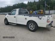 ✅ 1997 Ford F-150 • VIN: 1FTDF1722VNC49780 • Lot: 71014905. Listed on Copart with 322,639 mi. Free auction sales archive from the USA and detailed vehicle history report at DreamBid. Image 2.