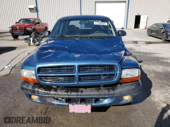 2002 Dodge Dakota Sport с VIN 1B7HL38N72S589857, выставлен на аукционе Copart как лот 77138924 с пробегом 197 117 миль миль и Списание • Salvage title. История ставок и продаж доступна на DreamBid. Изображение 5.