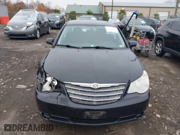✅ 2010 Chrysler Sebring Touring • VIN: 1C3CC4FB5AN148335 • Lot: 43754299. Listed on IAAI with 176,503 mi. Free auction sales archive from the USA and detailed vehicle history report at DreamBid. Image 12.