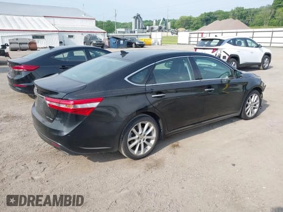 ✅ 2013 Toyota Avalon XLE • VIN: 4T1BK1EB4DU039798 • Lot: 42492812. Listed on IAAI with 199,613 mi. Free auction sales archive from the USA and detailed vehicle history report at DreamBid. Image 4.