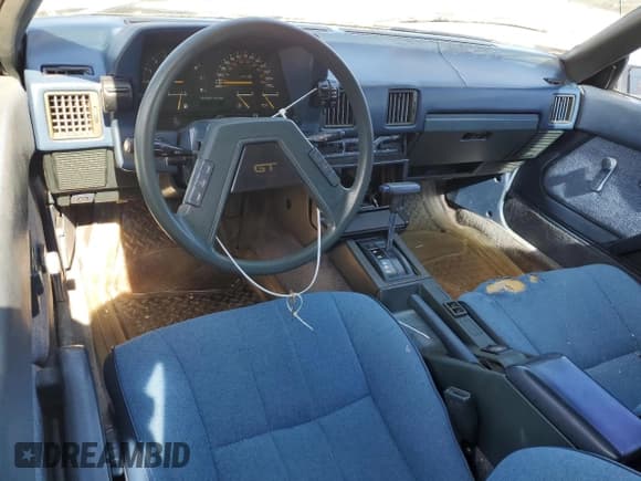 ✅ 1983 Toyota Celica • VIN: JT2RA64L7D6174381 • Lot: 75986554. Wystawiony na Copart z przebiegiem 312 583 mil. Bezpłatny archiwum sprzedaży aukcyjnych z USA i szczegółowy raport historii pojazdu na DreamBid. Zdjęcie 8.
