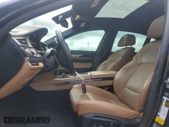 ✅ 2014 BMW 7 Series 750i xDrive • VIN: WBAYB6C58ED225139 • Lot: 63944075. Listed on Copart with 155,046 mi. Free auction sales archive from the USA and detailed vehicle history report at DreamBid. Image 7.