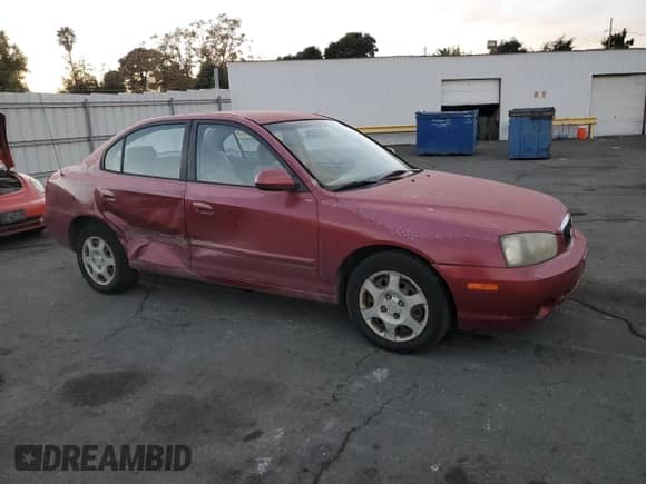 2003 Hyundai Elantra GLS z VIN KMHDN45D53U586516, wystawiony jako Copart lot #80085154 z przebiegiem 199 522 mil mil oraz Szkoda całkowita • Salvage title. Historia ofert i sprzedaży dostępna na DreamBid. Obrazek 4.