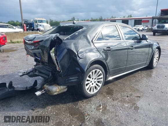 ✅ 2012 Cadillac CTS Premium • VIN: 1G6DP5E30C0146497 • Lot: 43841827. Listed on IAAI with 82,703 mi. Free auction sales archive from the USA and detailed vehicle history report at DreamBid. Image 4.