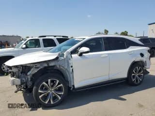 ✅ 2021 Lexus RX 350L • VIN: JTJHZKFAXM2030117 • Лот: 72025645. Опубликован ранее на Copart с пробегом 105 223 миль. Бесплатный доступ к архиву аукционных продаж из США и подробный отчёт об истории автомобиля на DreamBid. Изображение 1.
