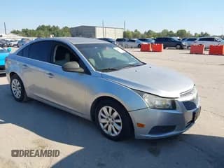 ✅ 2011 Chevrolet Cruze LS • VIN: 1G1PC5SH4B7220105 • Lot: 43474662. Listed on IAAI with 115,046 mi. Free auction sales archive from the USA and detailed vehicle history report at DreamBid. Image 1.