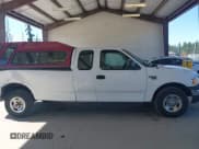 ✅ 2002 Ford F-150 XL • VIN: 2FTRX17W52CA32537 • Lot: 42720447. Wystawiony na IAAI z przebiegiem Nie podano. Bezpłatny archiwum sprzedaży aukcyjnych z USA i szczegółowy raport historii pojazdu na DreamBid. Zdjęcie 13.