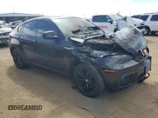 ✅ 2011 BMW X6 M • VIN: 5YMGZ0C54BLK13876 • Лот: 68567774. Опубликован ранее на Copart с пробегом Не указан. Бесплатный доступ к архиву аукционных продаж из США и подробный отчёт об истории автомобиля на DreamBid. Изображение 4.