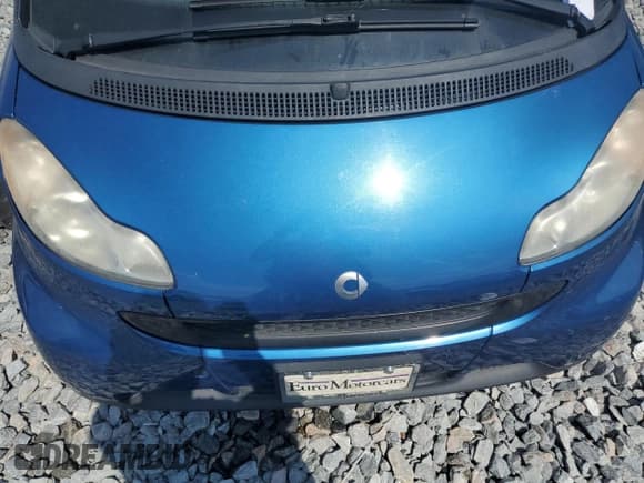 ✅ 2009 Smart fortwo Pure • VIN: WMEEJ31X69K312553 • Лот: 57811135. Опубликован ранее на Copart с пробегом 156 487 миль. Бесплатный доступ к архиву аукционных продаж из США и подробный отчёт об истории автомобиля на DreamBid. Изображение 11.