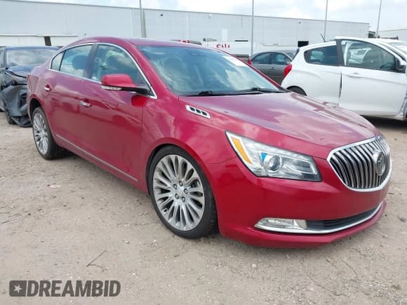 ✅ 2014 Buick LaCrosse Premium II • VIN: 1G4GF5G32EF163193 • Lot: 42647495. Wystawiony na IAAI z przebiegiem 121 029 mil. Bezpłatny archiwum sprzedaży aukcyjnych z USA i szczegółowy raport historii pojazdu na DreamBid. Zdjęcie 1.