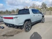 ✅ 2023 Rivian R1T Adventure • VIN: 7FCTGBAA6PN029019 • Lot: 43428333. Listed on IAAI with 13,983 mi. Free auction sales archive from the USA and detailed vehicle history report at DreamBid. Image 4.