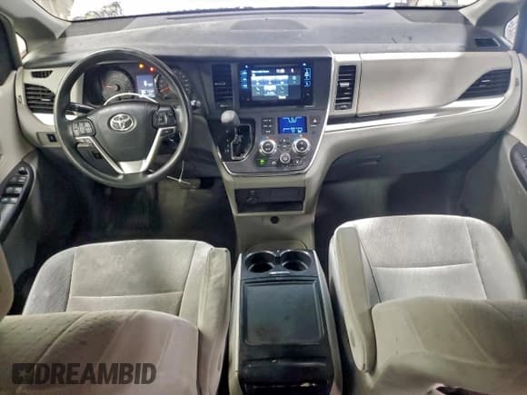✅ 2015 Toyota Sienna LE • VIN: 5TDKK3DCXFS594644 • Lot: 93735515. Listed on Copart with 106,597 mi. Free auction sales archive from the USA and detailed vehicle history report at DreamBid. Image 8.