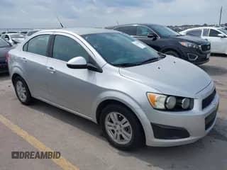 2014 Chevrolet Sonic LT with VIN 1G1JC5SH0E4197773, listed as a IAAI auction lot 43038055 with 144,591 mi miles and . Bid and sale history available at DreamBid. Image 1.