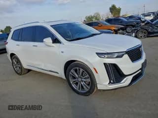 ✅ 2021 Cadillac XT6 Premium Luxury • VIN: 1GYKPCRS5MZ230218 • Lot: 95484715. Listed on Copart with 67,060 mi. Free auction sales archive from the USA and detailed vehicle history report at DreamBid. Image 4.