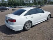 ✅ 2016 Audi A6 Premium Plus • VIN: WAUFGAFC9GN005463 • Lot: 43057864. Listed on IAAI with 129,969 mi. Free auction sales archive from the USA and detailed vehicle history report at DreamBid. Image 4.