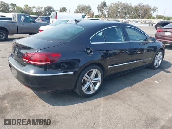 ✅ 2013 Volkswagen CC R-Line • VIN: WVWBP7ANXDE527320 • Lot: 42919160. Listed on IAAI with 121,128 mi. Free auction sales archive from the USA and detailed vehicle history report at DreamBid. Image 4.