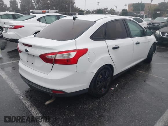 ✅ 2014 Ford Focus S • VIN: 1FADP3E20EL198440 • Lot: 43704241. Listed on IAAI with 78,827 mi. Free auction sales archive from the USA and detailed vehicle history report at DreamBid. Image 4.