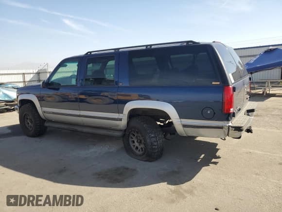 ✅ 1997 GMC Suburban • VIN: 1GKFK16R6VJ758513 • Lot: 75034574. Wystawiony na Copart z przebiegiem 181 873 mil. Bezpłatny archiwum sprzedaży aukcyjnych z USA i szczegółowy raport historii pojazdu na DreamBid. Zdjęcie 2.