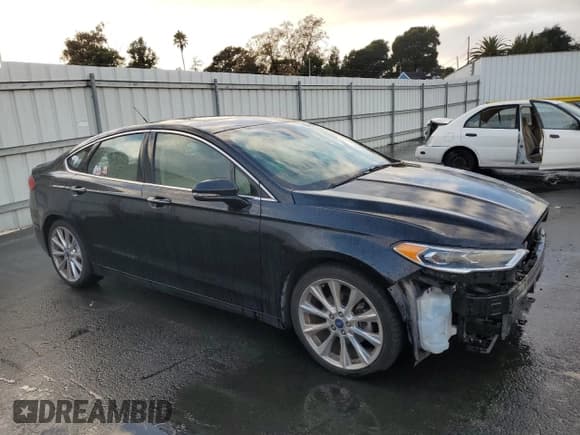 ✅ 2017 Ford Fusion Titanium • VIN: 3FA6P0K98HR110717 • Lot: 92962285. Listed on Copart with 97,761 mi. Free auction sales archive from the USA and detailed vehicle history report at DreamBid. Image 4.