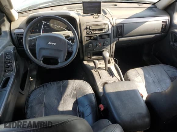 ✅ 2004 Jeep Grand Cherokee Laredo • VIN: 1J4GW48S04C269463 • Lot: 54611885. Listed on Copart with 155,675 mi. Free auction sales archive from the USA and detailed vehicle history report at DreamBid. Image 8.