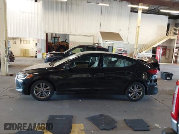 ✅ 2018 Hyundai Elantra Value Edition • VIN: 5NPD84LF0JH215514 • Lot: 43400585. Listed on IAAI with 101,238 mi. Free auction sales archive from the USA and detailed vehicle history report at DreamBid. Image 14.