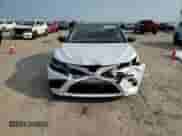 2021 Toyota Camry Hybrid XSE с VIN 4T1K31AK0MU026419, выставлен на аукционе Copart как лот 81029735 с пробегом 153 313 миль миль и Списание • Salvage title. История ставок и продаж доступна на DreamBid. Изображение 14.