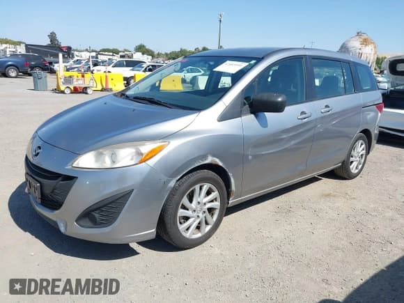 ✅ 2012 Mazda 5 Sport • VIN: JM1CW2BL9C0117627 • Lot: 42403991. Listed on IAAI with 124,239 mi. Free auction sales archive from the USA and detailed vehicle history report at DreamBid. Image 18.