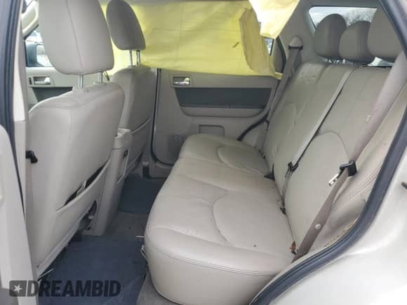 2009 Mercury Mariner with VIN 4M2CU81759KJ04555, listed as a Copart auction lot 85778504 with 130,514 mi miles and Salvage title. Bid and sale history available at DreamBid. Image 11.