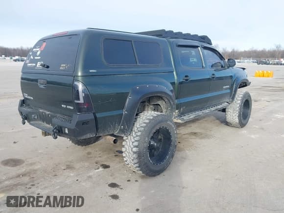 ✅ 2012 Toyota Tacoma • VIN: 3TMLU4EN8CM084941 • Lot: 41547330. Listed on IAAI with 118,460 mi. Free auction sales archive from the USA and detailed vehicle history report at DreamBid. Image 4.