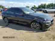 2018 BMW 3 Series 320i xDrive with VIN WBA8E5G57JNU46425, listed as a Copart auction lot 68207245 with 84,689 mi miles and Salvage title. Bid and sale history available at DreamBid. Image 4.