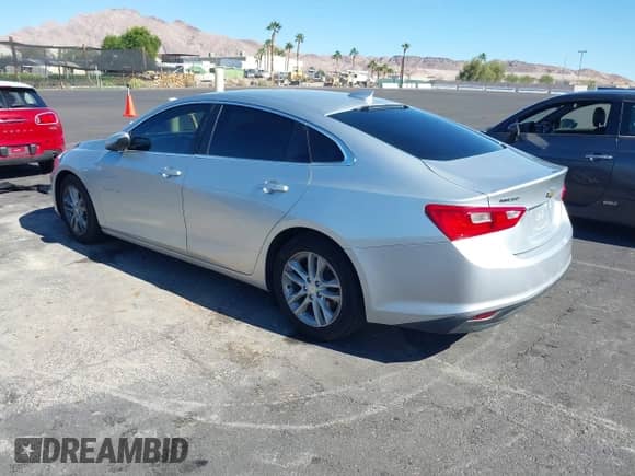 2016 Chevrolet Malibu LT z VIN 1G1ZE5ST0GF292956, wystawiony jako IAAI lot #43545640 z przebiegiem 156 966 mil mil oraz . Historia ofert i sprzedaży dostępna na DreamBid. Obrazek 3.