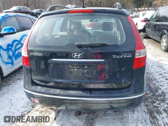 2010 Hyundai Elantra GLS with VIN KMHDC8AE7AU052667, listed as a IAAI auction lot 41586733 with 154,545 mi miles and . Bid and sale history available at DreamBid. Image 17.