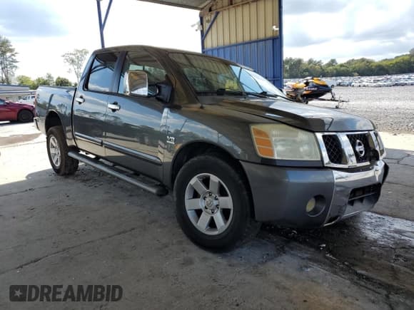 ✅ 2004 Nissan Titan LE • VIN: 1N6AA07A24N524160 • Лот: 82273295. Опубликован ранее на Copart с пробегом 263 591 миль. Бесплатный доступ к архиву аукционных продаж из США и подробный отчёт об истории автомобиля на DreamBid. Изображение 4.