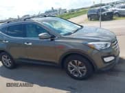 ✅ 2014 Hyundai Santa Fe • VIN: 5XYZUDLB1EG227778 • Lot: 43033757. Listed on IAAI with 135,496 mi. Free auction sales archive from the USA and detailed vehicle history report at DreamBid. Image 13.