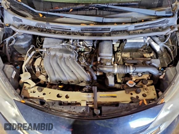 ✅ 2015 Nissan Note SL • VIN: 3N1CE2CP5FL414120 • Лот: 94950185. Опубликован ранее на Copart с пробегом 83 888 миль. Бесплатный доступ к архиву аукционных продаж из США и подробный отчёт об истории автомобиля на DreamBid. Изображение 11.