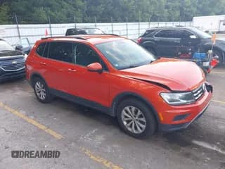 ✅ 2018 Volkswagen Tiguan S • VIN: 3VV0B7AX8JM074622 • Lot: 42929388. Listed on IAAI with 157,251 mi. Free auction sales archive from the USA and detailed vehicle history report at DreamBid. Image 1.