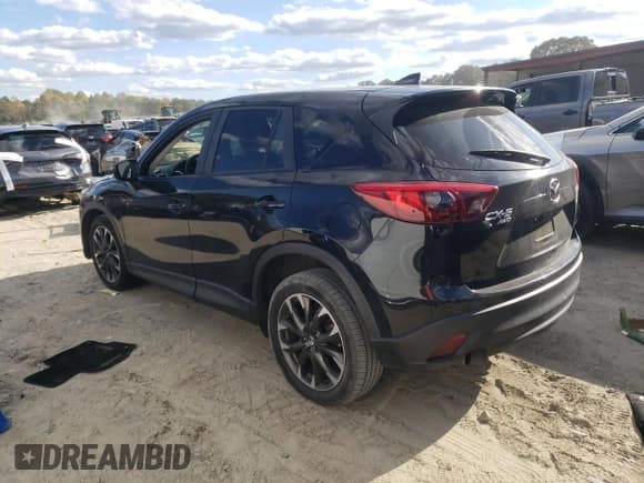 ✅ 2016 Mazda CX-5 Grand Touring • VIN: JM3KE4DY9G0764433 • Lot: 82728825. Wystawiony na Copart z przebiegiem 166 905 mil. Bezpłatny archiwum sprzedaży aukcyjnych z USA i szczegółowy raport historii pojazdu na DreamBid. Zdjęcie 2.