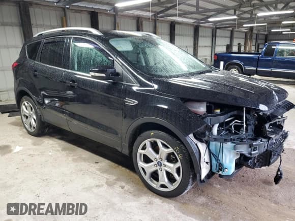 ✅ 2019 Ford Escape Titanium • VIN: 1FMCU9J9XKUC23625 • Lot: 90049675. Listed on Copart with 101,272 mi. Free auction sales archive from the USA and detailed vehicle history report at DreamBid. Image 4.