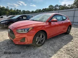 2020 Hyundai Veloster 2.0 с VIN KMHTG6AF1LU031975, выставлен на аукционе Copart как лот 80393425 с пробегом 77 062 миль миль и Списание • Salvage title. История ставок и продаж доступна на DreamBid. Изображение 1.