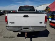 ✅ 1998 Ford F-250 • VIN: 1FTPX28L9WKB01247 • Lot: 70723084. Listed on Copart with 119,870 mi. Free auction sales archive from the USA and detailed vehicle history report at DreamBid. Image 6.