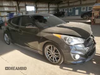 ✅ 2014 Hyundai Veloster Turbo • VIN: KMHTC6AE6EU210552 • Lot: 63122884. Listed on Copart with 85,214 mi. Free auction sales archive from the USA and detailed vehicle history report at DreamBid. Image 4.
