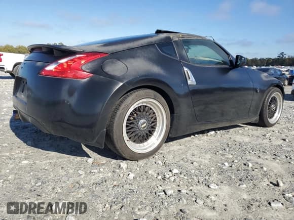 ✅ 2009 Nissan 370Z • VIN: JN1AZ44EX9M404083 • Lot: 91008375. Listed on Copart with 185,773 mi. Free auction sales archive from the USA and detailed vehicle history report at DreamBid. Image 3.