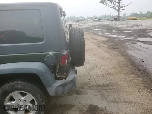✅ 2007 Jeep Wrangler X • VIN: 1J4GA39187L206775 • Lot: 60128205. Listed on Copart with 243,826 mi. Free auction sales archive from the USA and detailed vehicle history report at DreamBid. Image 13.