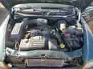2002 Dodge Dakota z VIN 1B7GG12X52S705975, wystawiony jako Copart lot #75224734 z przebiegiem 150 441 mil mil oraz Szkoda całkowita • Salvage title. Historia ofert i sprzedaży dostępna na DreamBid. Obrazek 11.